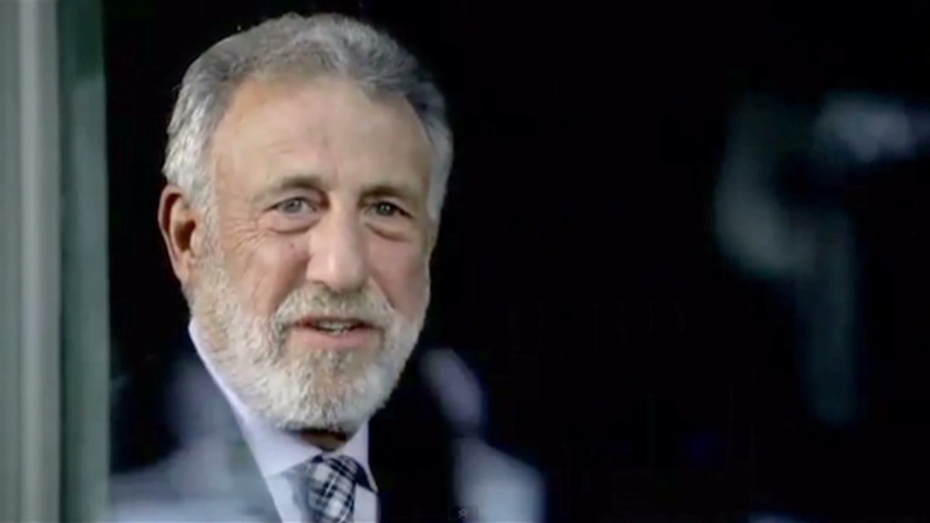 George Zimmer packs his suit and tie