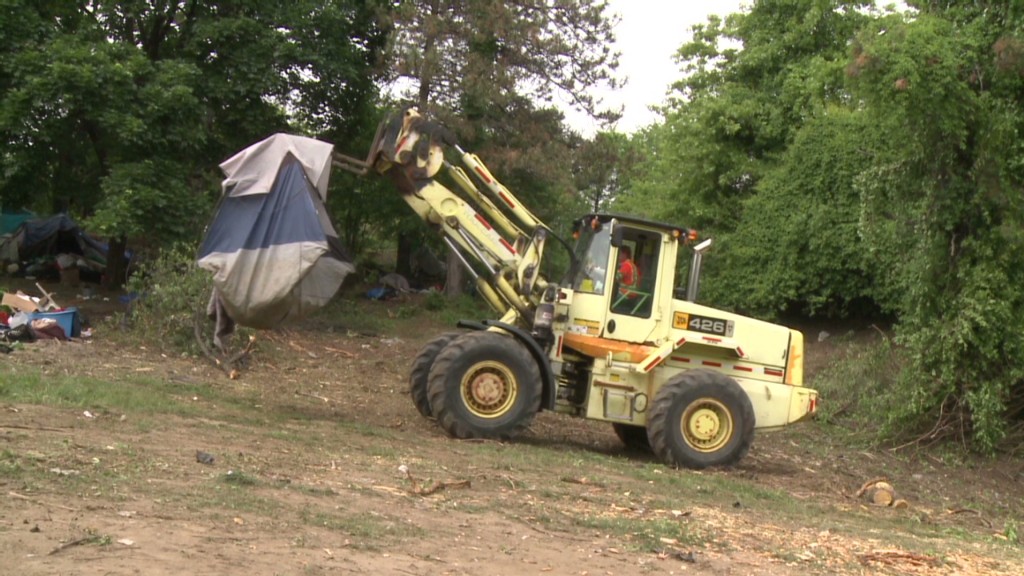 Watch a tent city get bulldozed