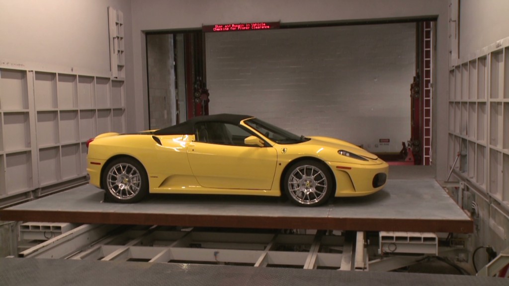 Super rich store Ferraris in robotic vault
