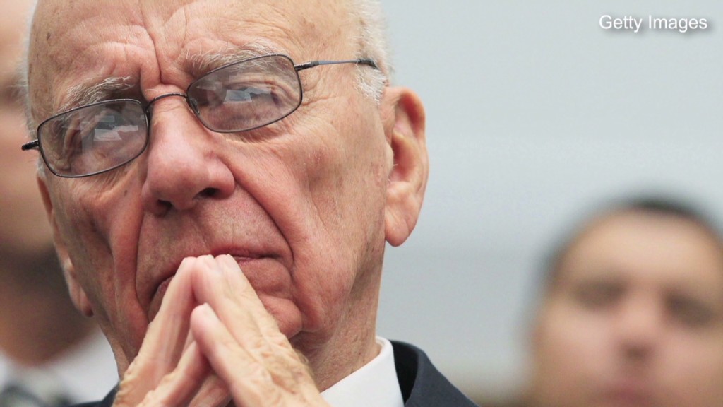 Murdoch backs down from Time Warner bid