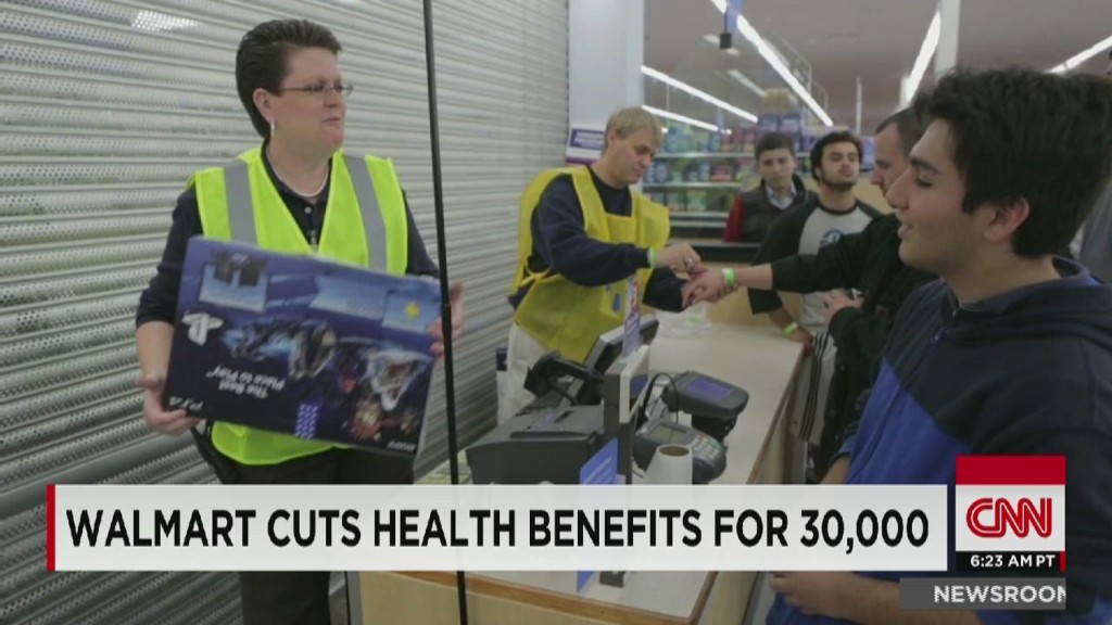 Wal-Mart cuts benefits for 30,000 workers