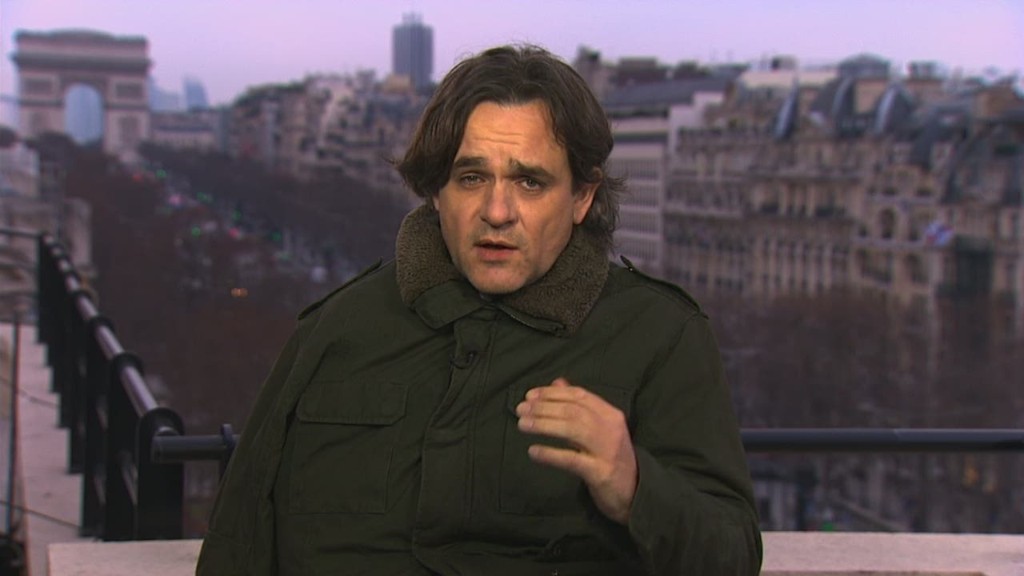  'Charlie Hebdo does not stop people from believing'