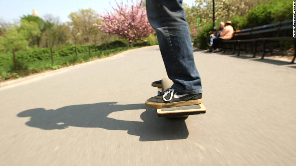 Commute to work on a one-wheeled scooter