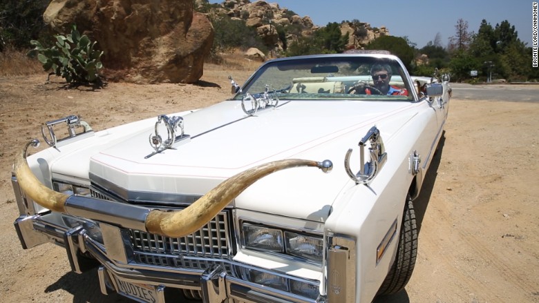 Peter in nudie car in desert