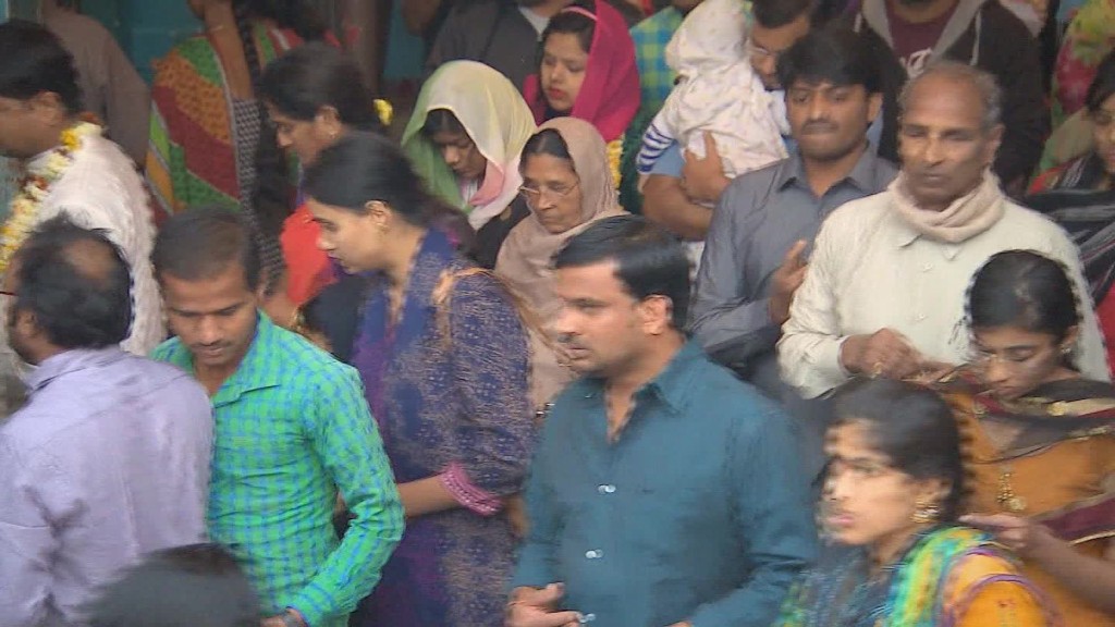 Praying at the 'visa' temple in India