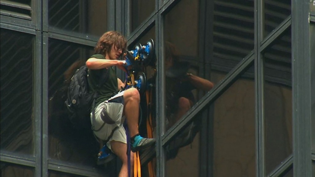 Man scales Trump Tower with suction cups