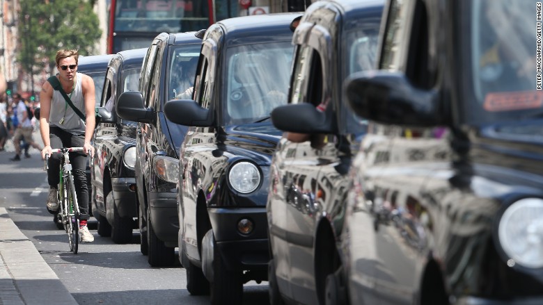 black cabs taxis london bike