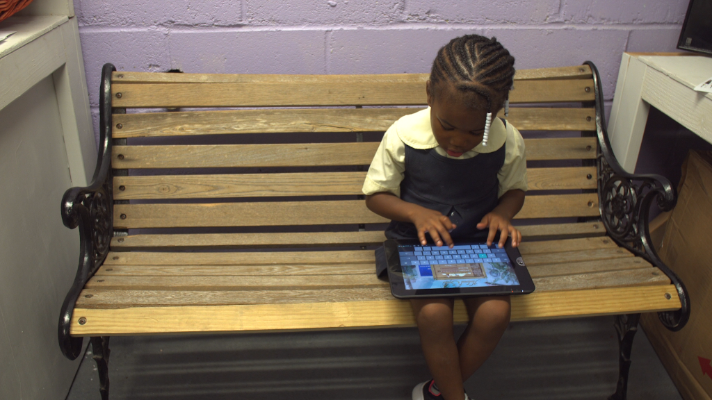 Inside this laundromat there's a coding school