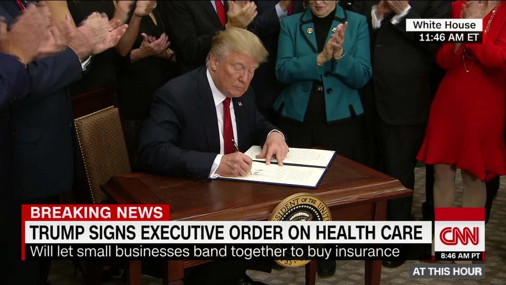 Trump signs health care executive order (after nearly forgetting)