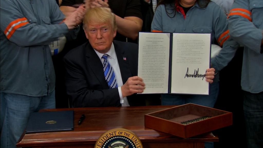 Trump signs new steel, aluminum tariffs