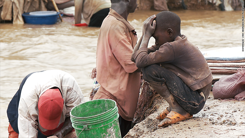 cobalt mining kids head in hands