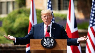 Trump ratchets up 'fake news' rally cry overseas during UK visit