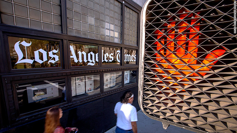 la times building stop pedestrian sign