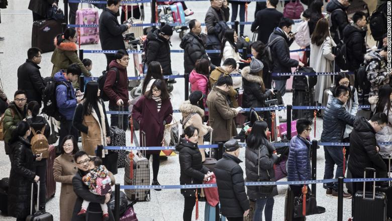   Chinese travelers at the airport checkin 