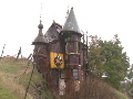 A castle made of car parts and other junkyard finds